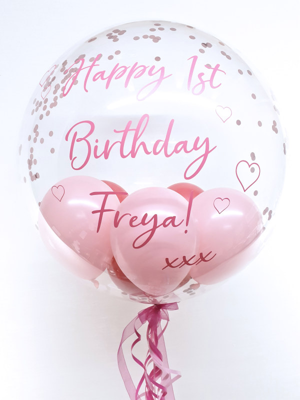 Personalised confetti balloon in a box, shades of pink with hearts